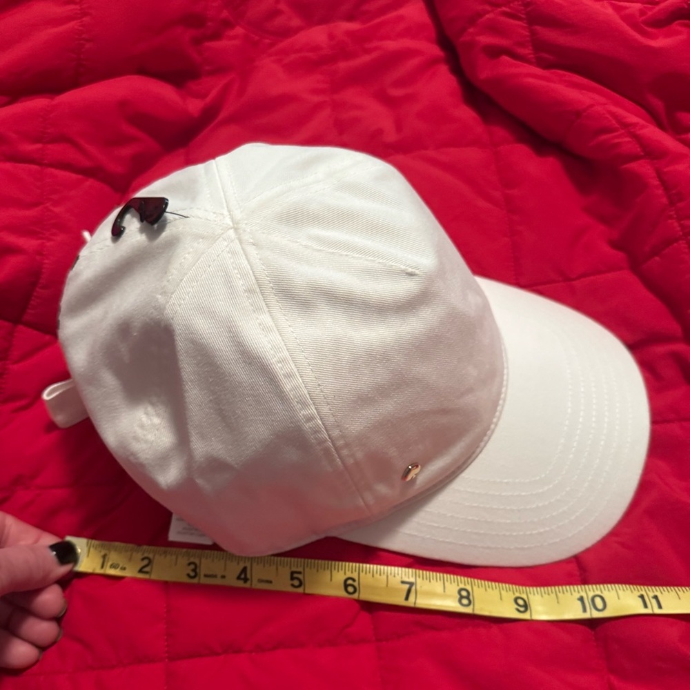 Kate Spade winter White Cap w/ Bow, black wording,iconic ♠️in gold!cute& classy